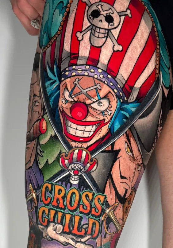 Colour anime-style pirate clown tattoo on a leg by Raül de la O